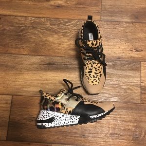 Lace up Tennis Shoes.